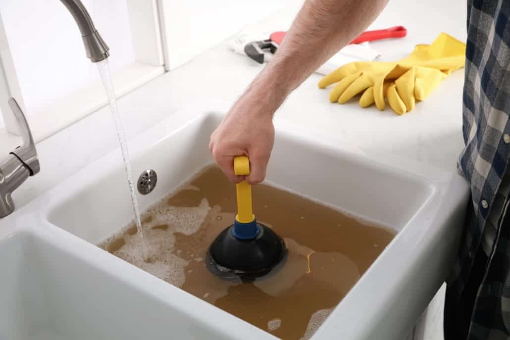 How To Unclog a Garbage Disposal With Standing Water